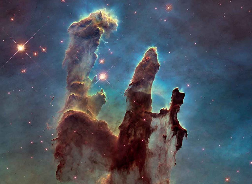 A picture of Eagle Nebula's - Pillars Of Creation, Credit NASA, ETCL and ESA.