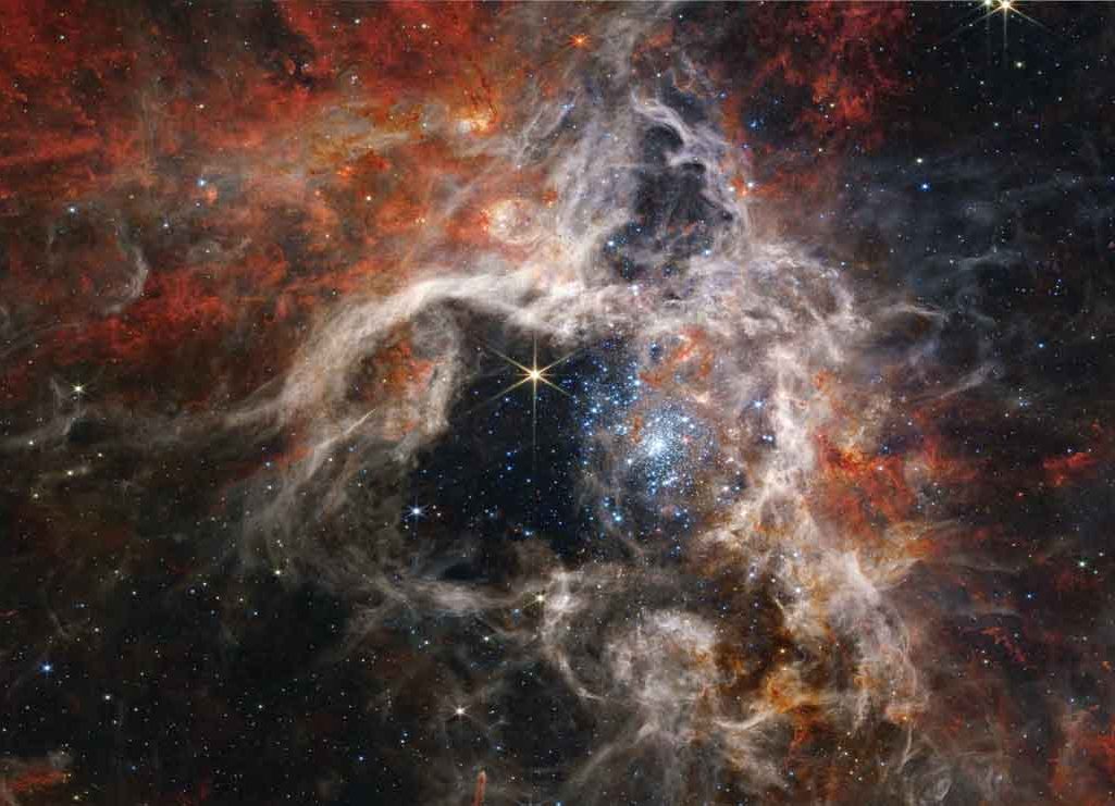 A picture of NASA's Tarantula Nebula taken by the James Webb Space Telescope.